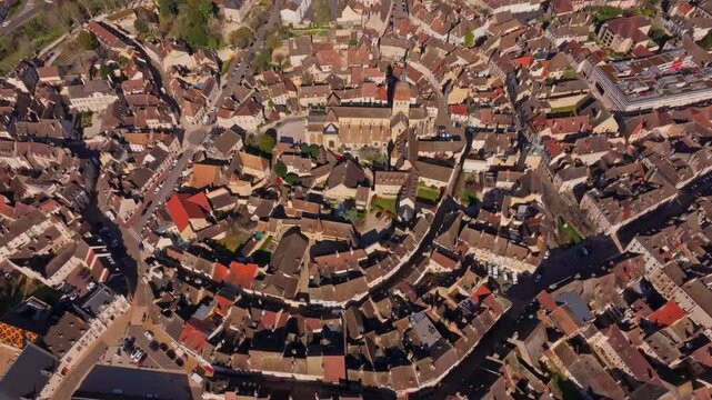 French town of Beaune centered around Notre-Dame church. Aerial drone video