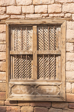 Saudi Arabia, Medina. Barred and shuttered wooden window in old town Al-Ula.