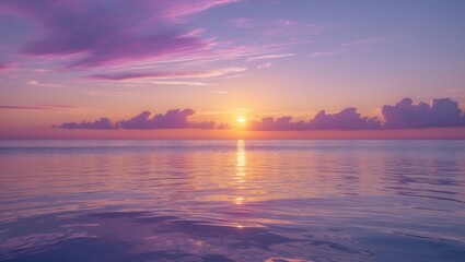 Obraz premium Serene ocean at sunset with clouds and sun peeking through. Meditative background of sea and sky. Peaceful seascape. Horizon above the water.
