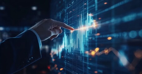 A hand touches a digital screen displaying financial data and graphs in blue.