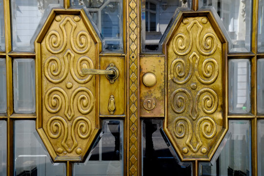 Vienna, Austria. Brass art deco door detail