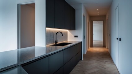 Updated kitchen showcasing upper cabinets, granite countertops with a backsplash, a sink, wooden parquet flooring, and a view into an unoccupied corridor and adjacent spaces.