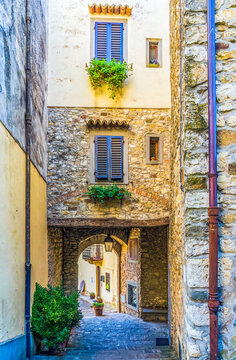 Greve in Chianti, Tuscany, Italy. Ancient town showing colorful buildings with shuttered windows.
