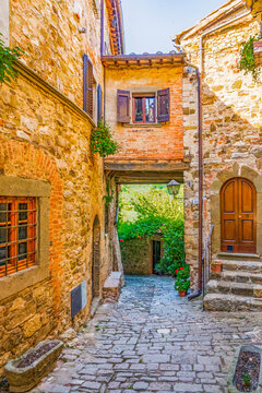 Greve in Chianti, Tuscany, Italy. Ancient buildings showing shuttered windows and stonework walls.
