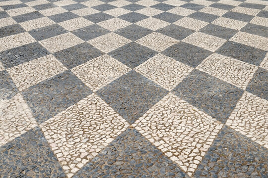 Tomar, Portugal. Typical patterned cobblestone walkways
