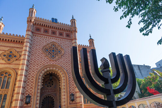 Romania, Bucharest. Choral Temple, Copy of Vienna's Great Synagogue. Menorah sculpture in front.