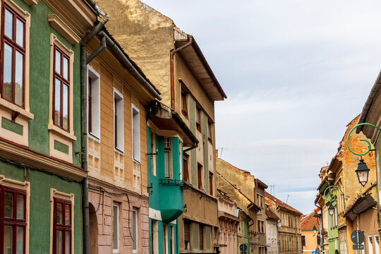 Romania Brasov. 16th century arcaded, and terra cotta roofed houses and narrow streets.