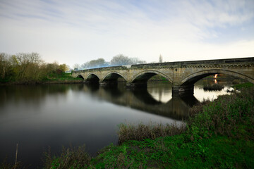 Fototapeta premium Willington Bridge Crossing the River Trent in Derbyshire