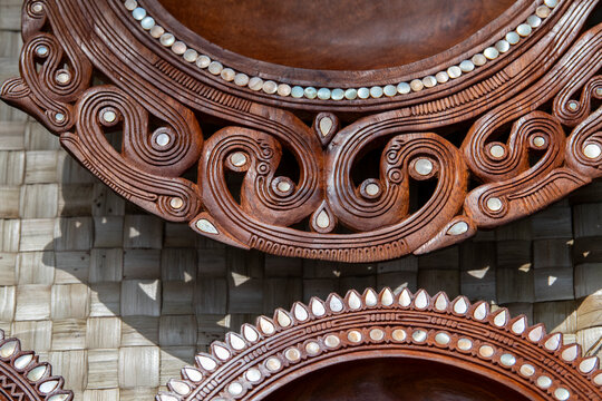 Papua New Guinea, Milne Bay Province, Kuiawa Island. Hand carved wooden bowl with shell inlay.