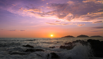 Fototapeta premium Mazatlan beaches, sunsets and scenic slow motion ocean swells and waves near Malecon sea promenade.