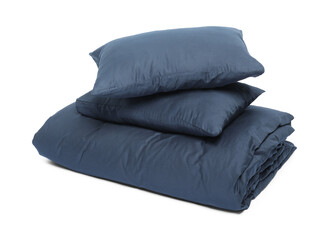 Silky bed linens and pillows on white background