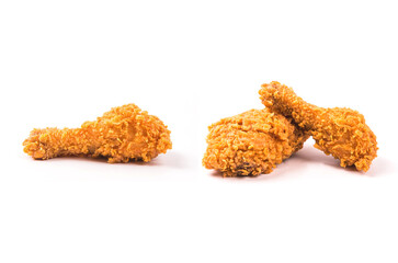 Fried chicken drumsticks isolated on white background.