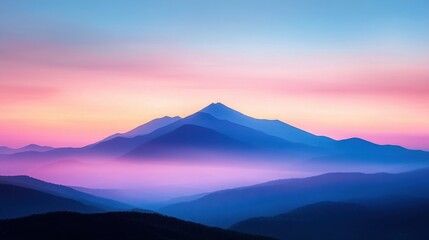 Sunrise over misty mountains with vibrant colors and soft clouds