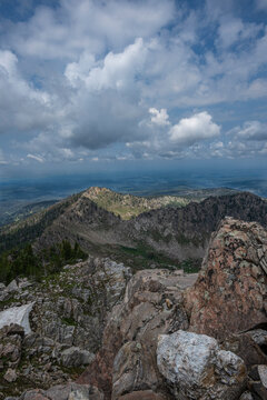 USA, Wyoming. Rugged landscape of Rammell Mountain and view of distant valley.