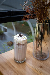 Tiramisu frappe on cafe table. Beverages. Cold and summer drink.