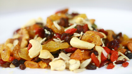 Mixed nuts. Snack food consisting of any mixture of mechanically or manually combined nuts.