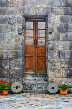 Entrance door inset between stone walls built by the Inca in the 1440's in Ecuador.