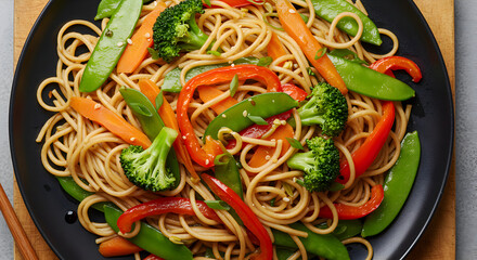 Delicious Noodles Stir Fry With Fresh Vegetables On Dark Plate