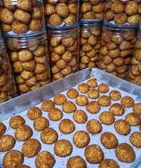 Golden palm sugar cookies freshly baked and packed in jars