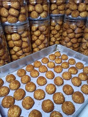 Golden palm sugar cookies freshly baked and packed in jars