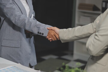 Business handshake for teamwork of business merger and acquisition,successful negotiate,hand...