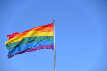 rainbow flag flying high in the sky1