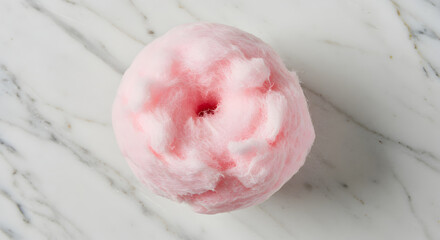 Fototapeta premium Delicate Pink Cotton Candy Delight On Marble Background for Sweet Tooth