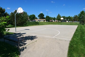 Basketball court in park in summer, Colorado