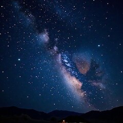 Fototapeta premium Mesmerizing swirls of milky way against dark blue night sky with shining stars, nebula, constellations