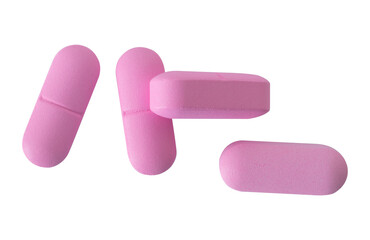 pink pills isolated on white