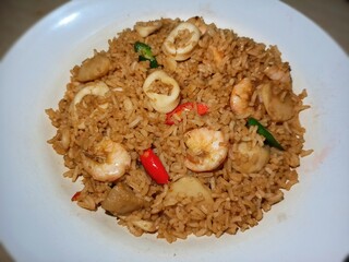 Delicious Seafood Fried Rice Sitting Nicely on White Plate