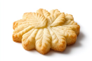 Golden Baked Cookie with Leaf Pattern on White Background Close-up