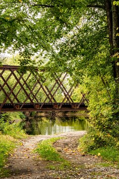 USA, Vermont, Whiting. 1896 metal railroad trestle bridge over tributary to Otter Creek.