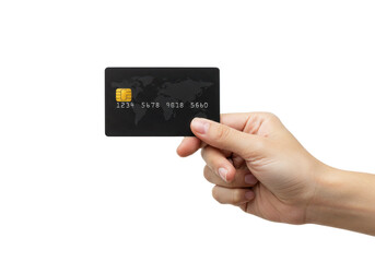 Hand holding a credit card while making an online purchase.