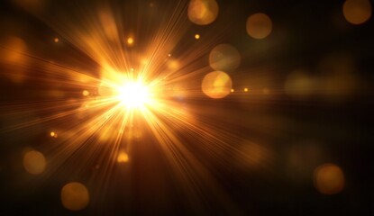 Bright golden light burst with bokeh effect on black background.