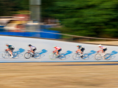 Bicyclists racing in the Jerry Baker Memorial Velodrome, Redmond, Washington State.