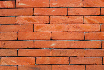 abstract background, red brick wall with pattern and neat arrangement, abstract wallpaper background