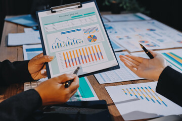 Business analyze,Close up Business people meeting to discuss the situation on the market. Business...