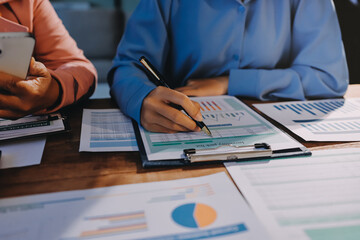 Business analyze,Close up Business people meeting to discuss the situation on the market. Business...