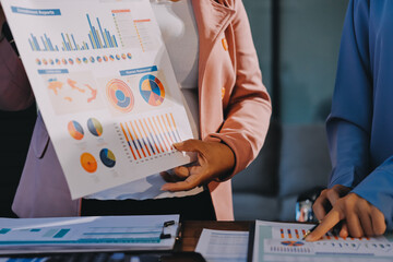Business analyze,Close up Business people meeting to discuss the situation on the market. Business...