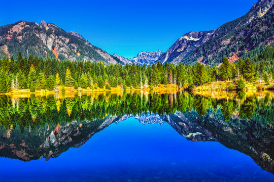 Gold Lake water reflection Mount Chikamin, Snoqualmie Pass, Wenatchee NF, Washington State, Usa.