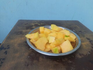 A papaya is a tropical, melon-like fruit, known for its sweet, slightly creamy texture and vibrant colors. It's a popular fruit, enjoyed fresh, in smoothies, or added to various dishes