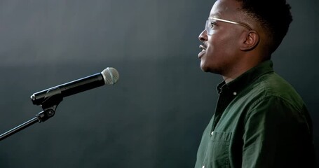 Young colleagues congratulating each other in classroom, handing certificate and sharing joy