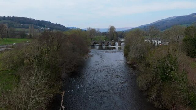 Crickhowell Bridge 4K Aerial Video Over River Usk in Wales with Stone Arches and Flowing Water