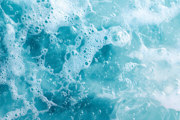 Transparent blue clear water wave surface texture with splashes and bubbles white. Abstract summer banner background Water waves in sunlight. Cosmetic moisturizer micellar toner emulsion. copy space.