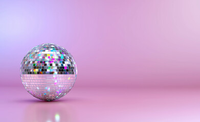 Shiny disco ball reflecting colorful lights on a smooth pink background with space for text.
