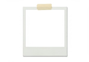 A blank polaroid frame taped to a white background ready for a picture or message to be inserted
