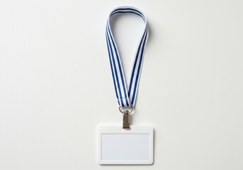 Identification badge with a blue and white striped lanyard on a plain white background centered frame 100