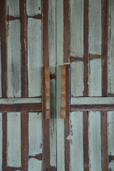 old wooden door with rusty nails