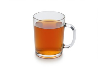 A clear glass mug filled with a dark amber liquid sitting on a white surface in a studio shot
